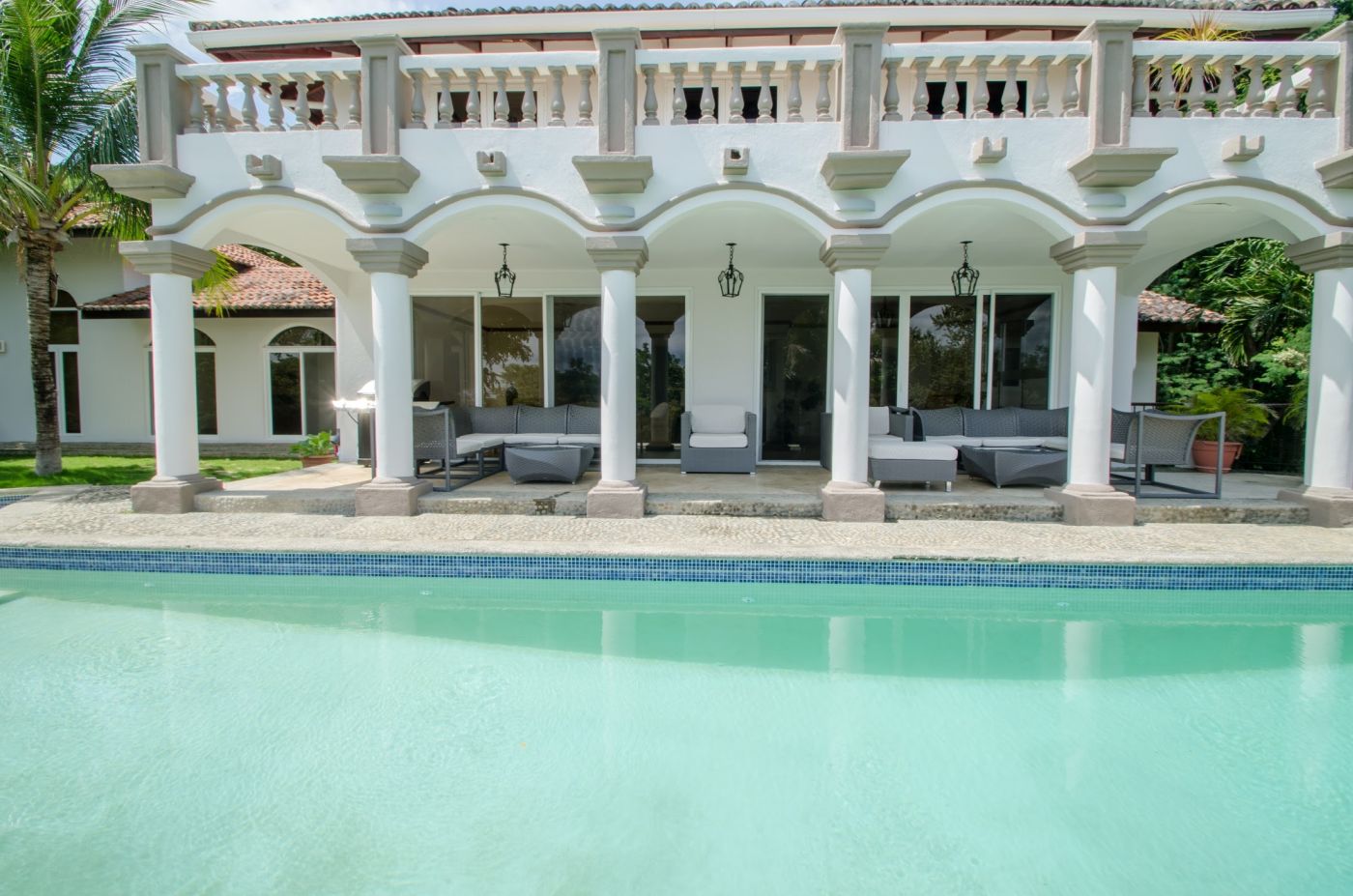 Casa Guacalito’s infinity pool looking toward the terrace and seating area.